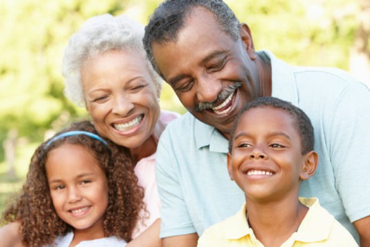 Smiling grandparents with grandchildren