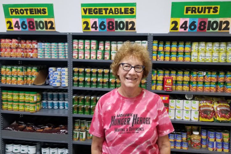 Woman volunteering at pantry